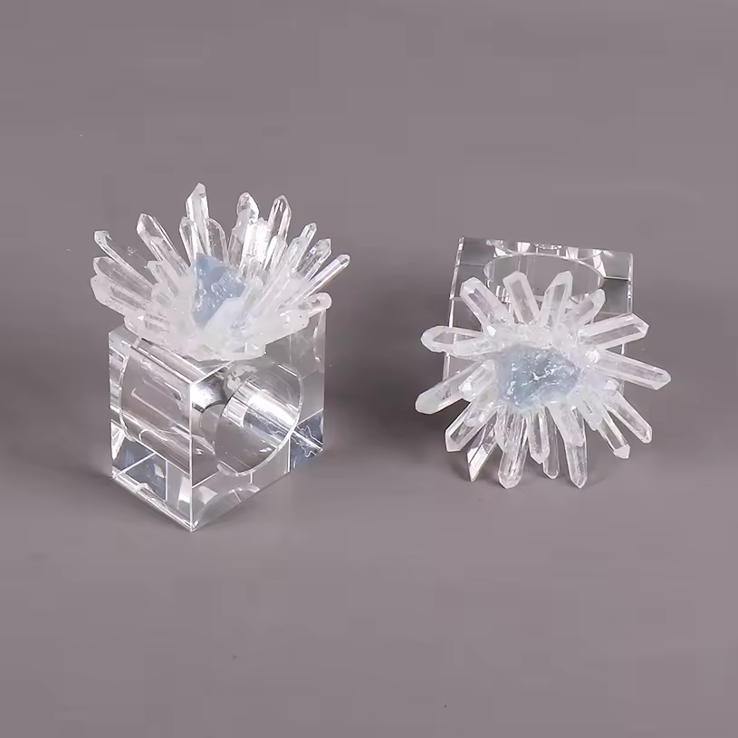 Well Building Connection crystal quartz napkin rings, displayed against a neutral background.
Elevate your dining experience with the timeless beauty, Crystal Quartz Napkin Rings. Designed to add a touch of elegance and sophistication to any table setting, these stunning napkin holders feature natural crystal quartz stones set in high-quality metal rings, creating perfect blend of luxury and functionality.
