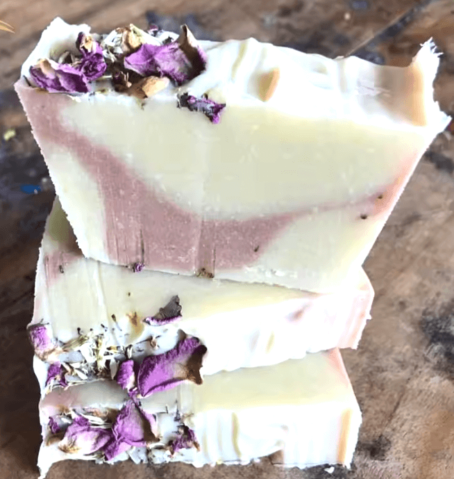 Handmade natural soap bar with lavender and rose petals embedded in the surface. Lavender Livy and Mia Rose Hand-Made Natural Soap

Indulge in the soothing, aromatic experience of Lavender Livy &amp; Mia Rose Handmade Natural Soap, crafted with love and care using 100% natural ingredients. This luxurious soap bar combines the calming essence of lavender with the delicate, floral notes of Mia rose, creating a relaxing and rejuvenating bathing experience.

Handmade in small batches at Well Building Connection