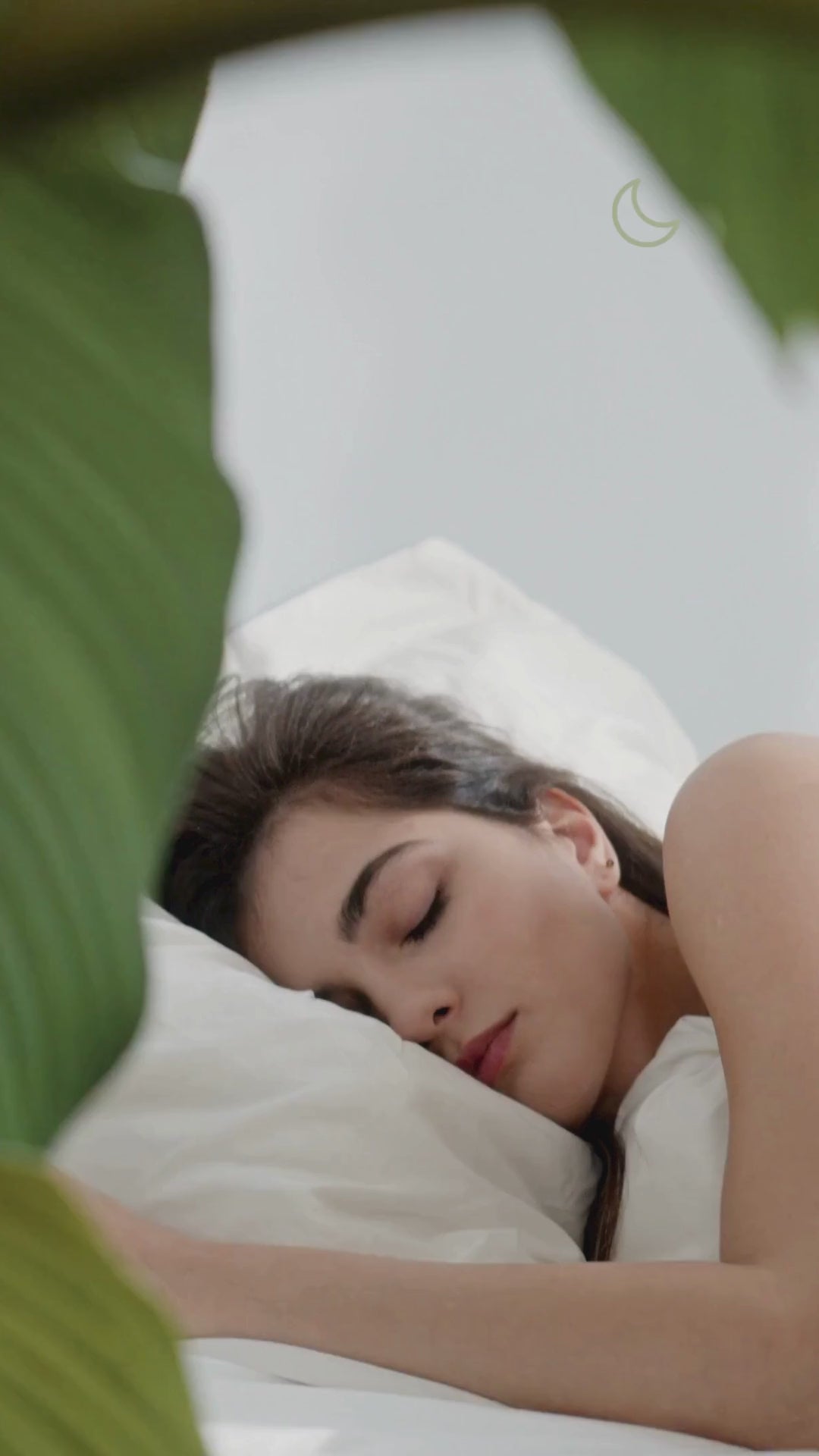 Well Building connection woman sleeping in comfortable bedding, in relaxing spaces, for better nights sleep to improve productively and overall wellbeing. What price can someone put on a good night's sleep?